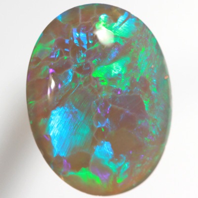 SOLID BLACK CRYSTAL OPAL Rolling flashes of green and turquoise fire